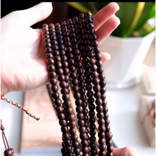 Trợ giá chuỗi hạt niệm Phật 108 hạt gỗ mun đuôi công 8ly