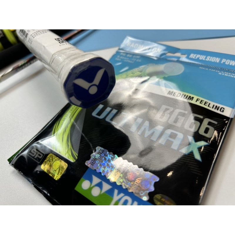 Vợt cầu lông Ruyga cam khung carbon căng max 13kg