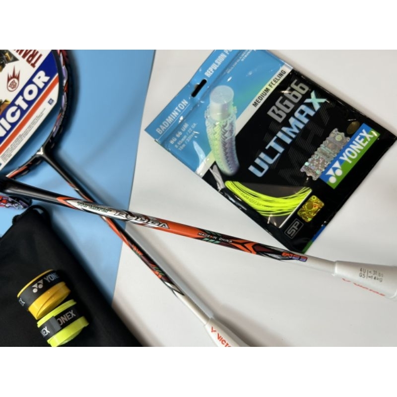 Vợt cầu lông Ruyga cam khung carbon căng max 13kg