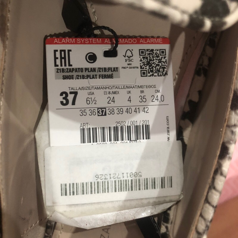 Giày sục vân da rắn Zara