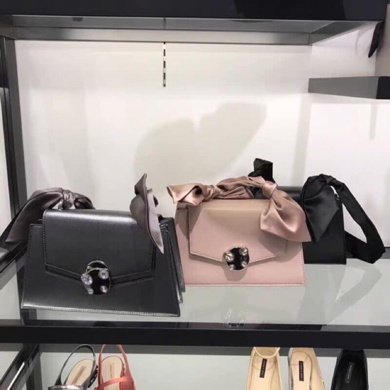 Túi CNK đen quai lụa