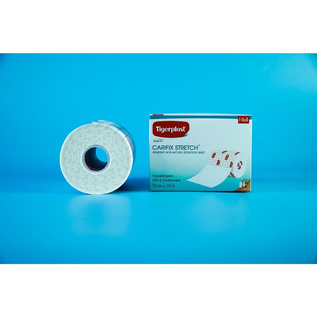 Cuộn băng keo y tế co giãn Tigerplast Carifix Stretch dán bông gạc - Tấm 10cm dài 10m