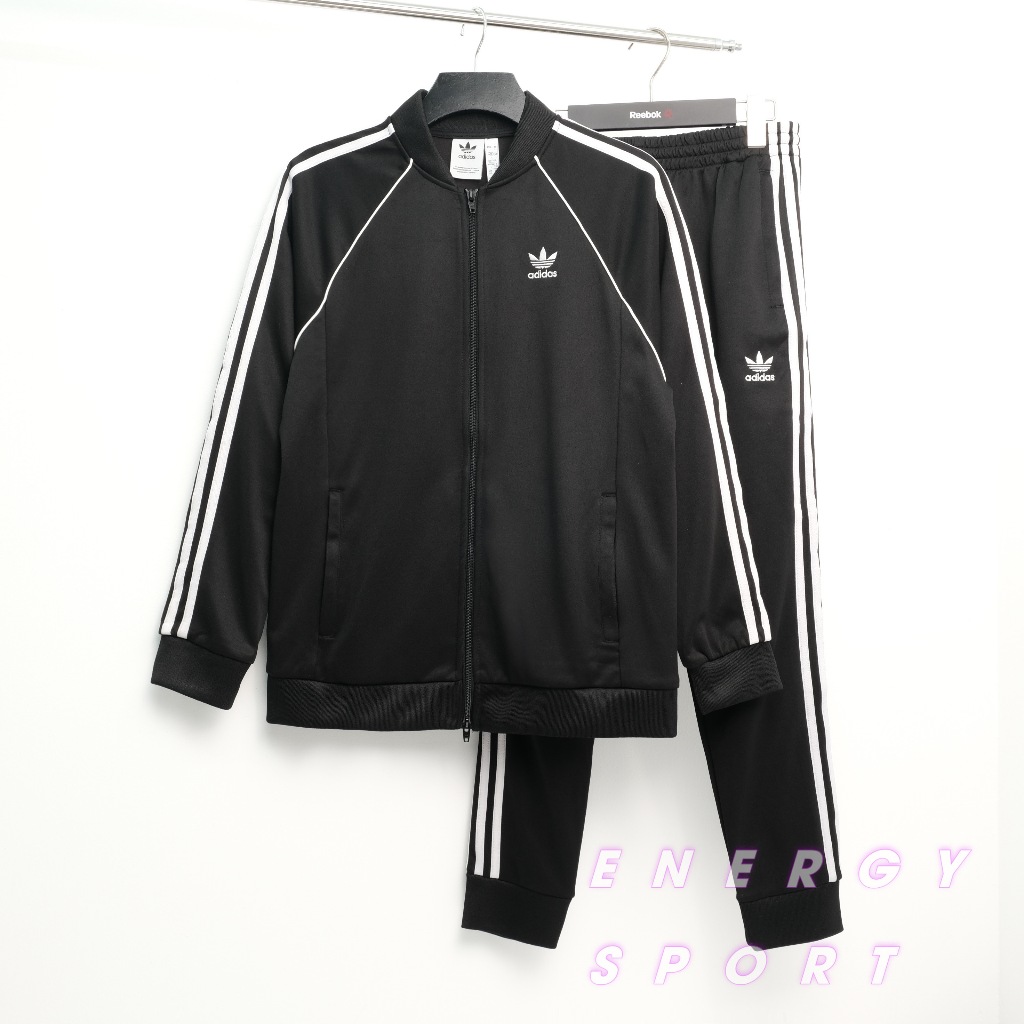 Bộ Quần Áo Thể Thao Unisex Nam Nữ Adidas Adicolor Classic Primeblue SST Track - Màu Đen