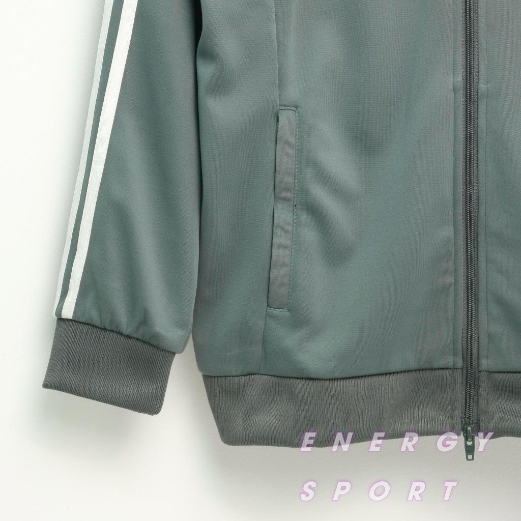 Bộ Quần Áo Thể Thao Unisex Nam Nữ Adidas Adicolor Classic Primeblue SST Track - Màu Xi Măng