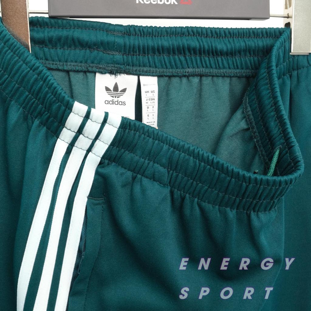 Bộ Quần Áo Thể Thao Unisex Nam Nữ Adidas Adicolor Classic Primeblue SST Track - Màu Xanh