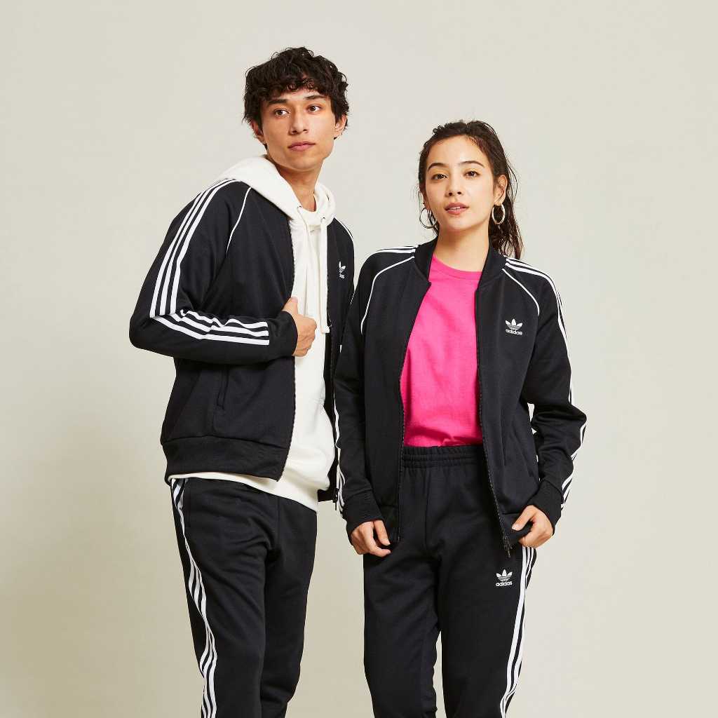 Bộ Quần Áo Thể Thao Unisex Nam Nữ Adidas Adicolor Classic Primeblue SST Track - Màu Đen