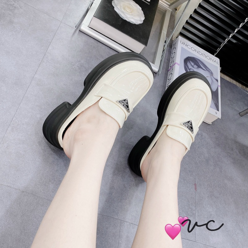 Sục tag các hãng da bóng 2 màu đen kem