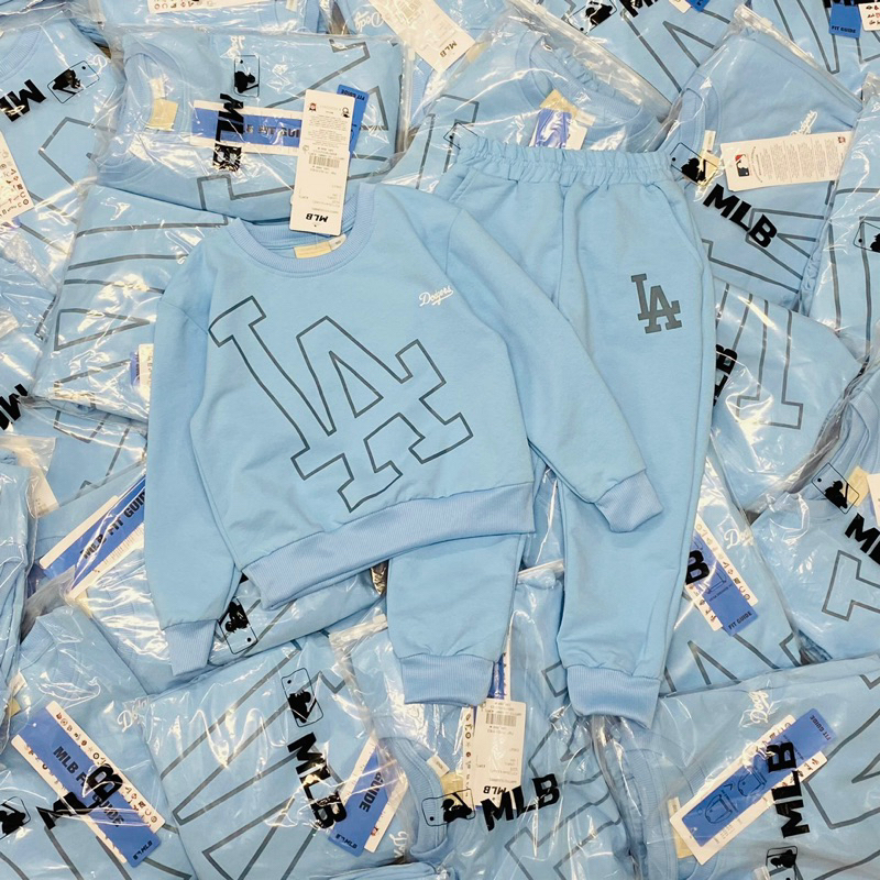 Bộ nỉ da cá in logo LA M.lb cho bé trai màu xanh size từ 12-35 cân