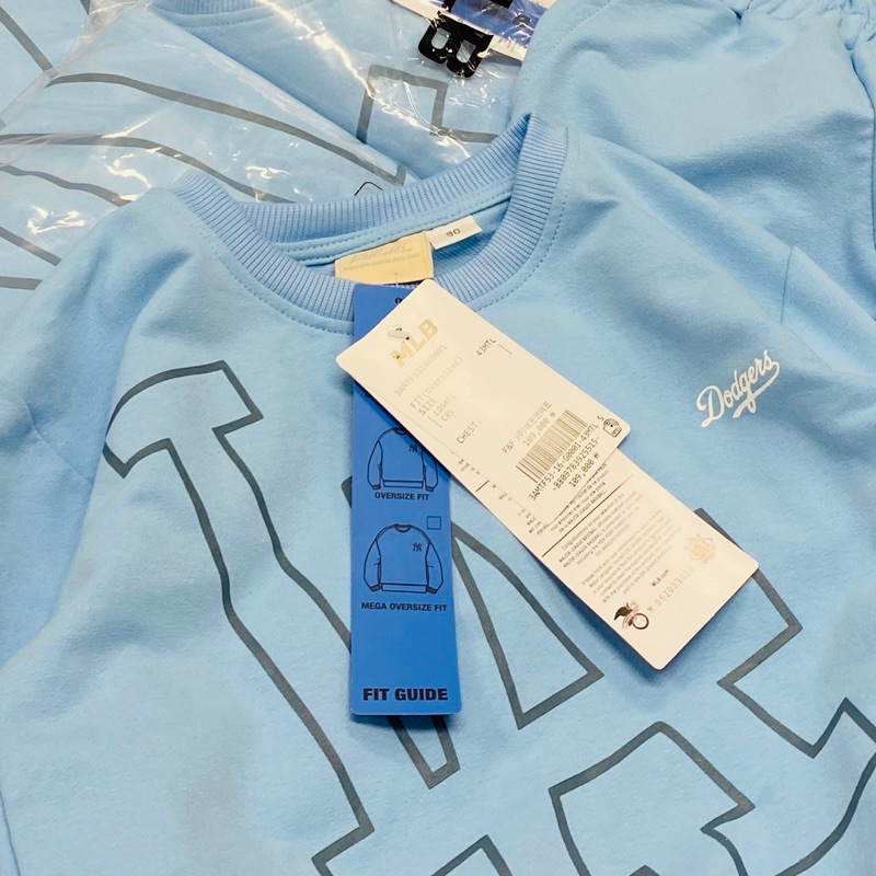 Bộ nỉ da cá in logo LA M.lb cho bé trai màu xanh size từ 12-35 cân