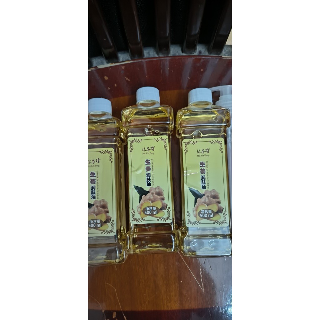 Dầu gừng massage body, đả thông kinh lạc