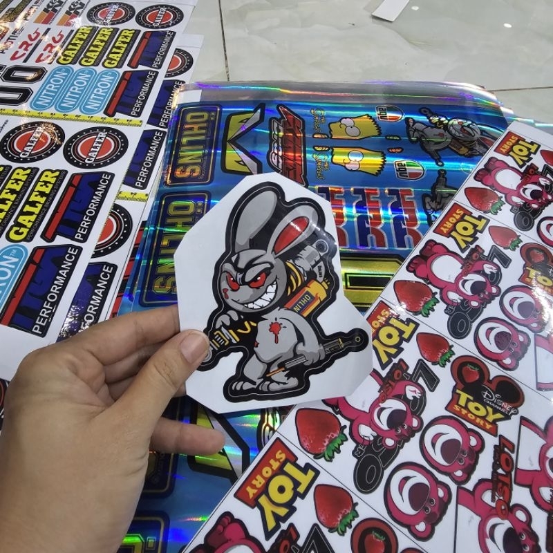 Tem sticker thỏ điên cầm phuộc OH 10cm