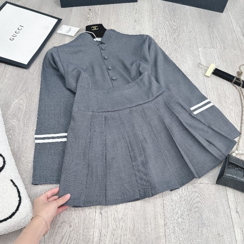 Set nữ áo cổ tàu sọc tay mix chân váy xếp li