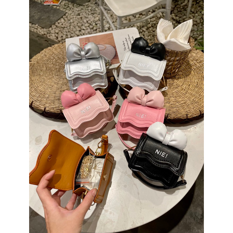 Túi mini đeo chéo dập viền gân đính nơ xinh xắn 6 màu