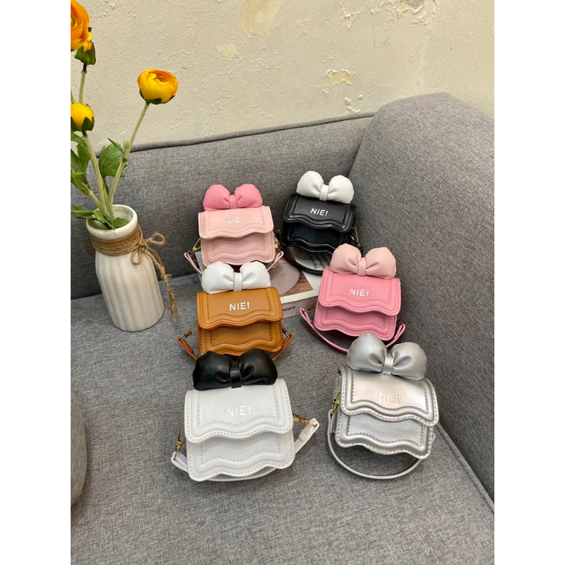 Túi mini đeo chéo dập viền gân đính nơ xinh xắn 6 màu