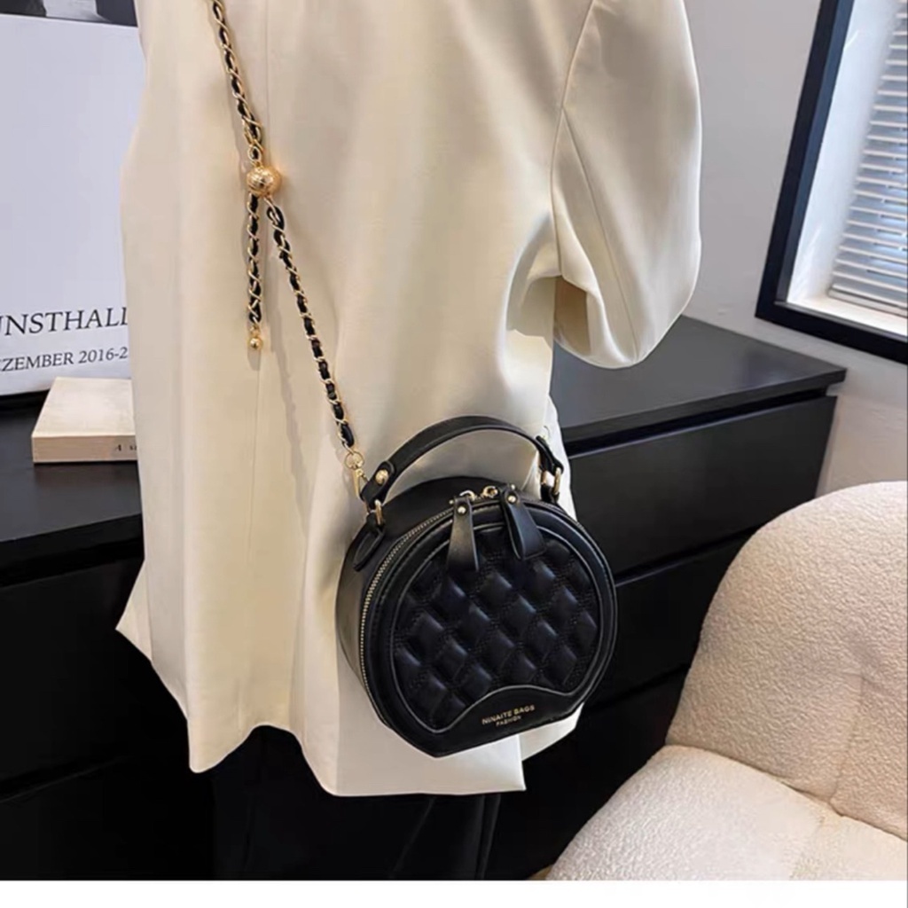 Túi xách đeo chéo nữ dáng tròn thời trang TX60