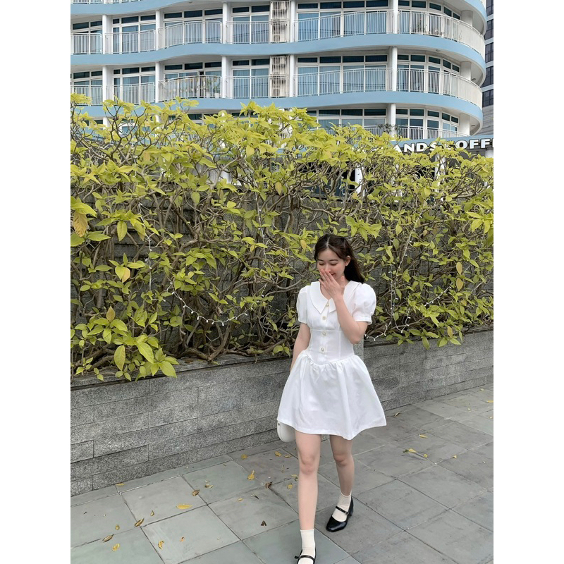 Váy xòe đính cúc ngọc