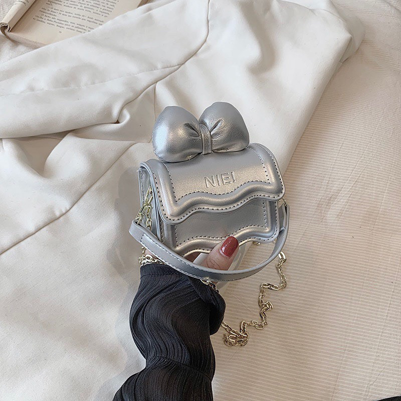 Túi mini đeo chéo dập viền gân đính nơ xinh xắn 6 màu