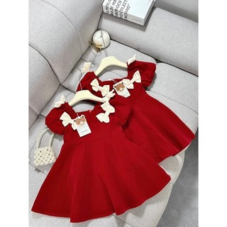 Váy nhung đỏ bệt vai 4 nơ trắng bé gái