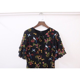 Đầm hoa văn T.Shop