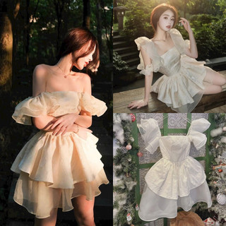 Đầm xốp tay phồng đan lưng