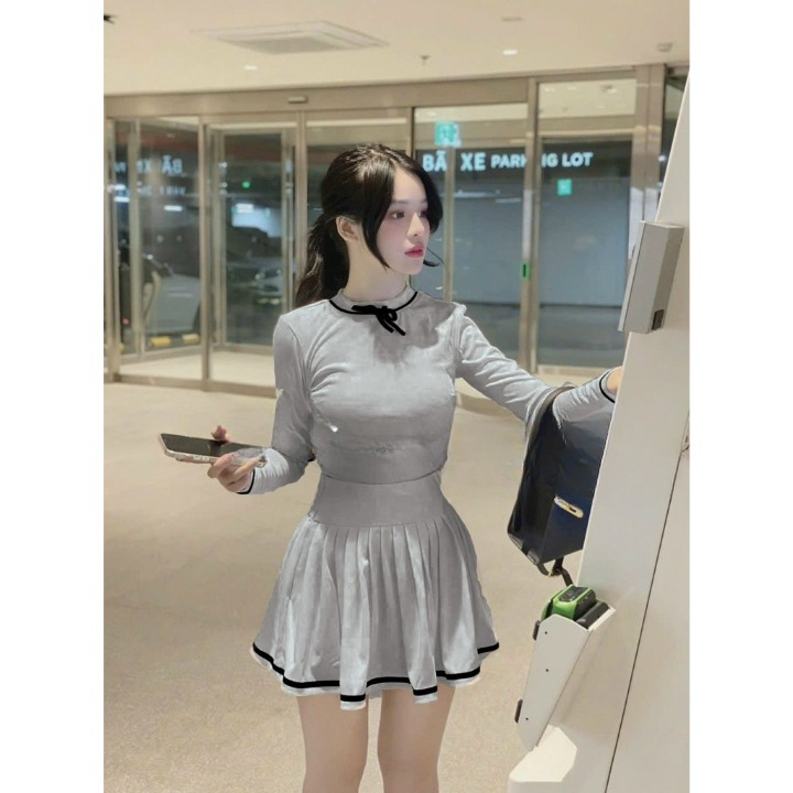 Set đồ nữ - Áo thun dài tay mix chân váy xếp ly chất liệu len tăm dáng ngắn có lót trong thắt nơ gin62.store