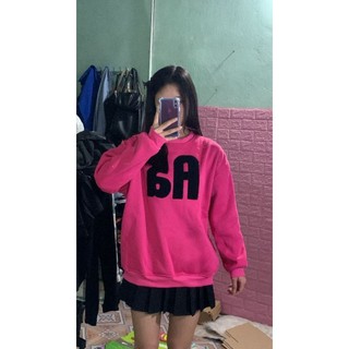 Áo sweater hồng