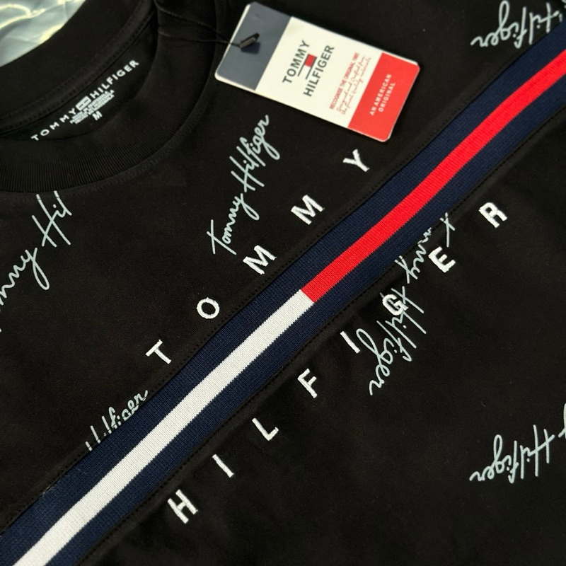 Áo thun Tom chữ kí nam nữ mới nhất Áo thun Tom thêu chữ nam nữ mới nhất