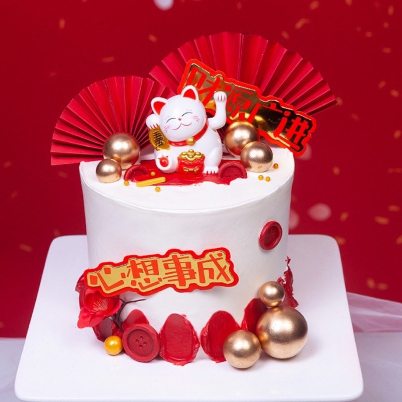 Mèo Thần Tài trang trí tài lộc