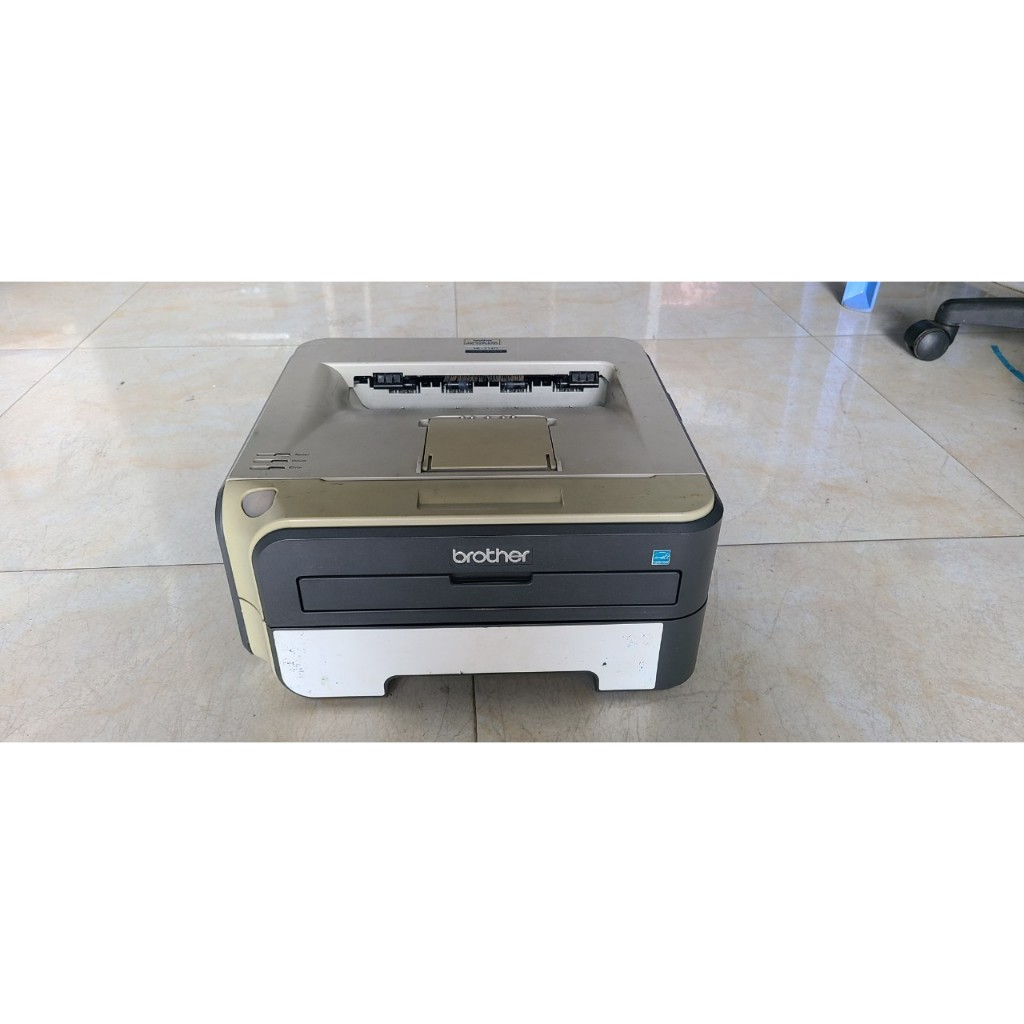 Máy in Brother , model : HL-2140 bảng in đẹp, ngoại hình liền lạc, bảo hành 1 tháng , mã B1