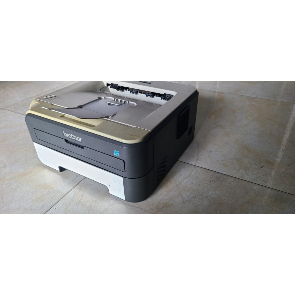 Máy in Brother , model : HL-2140 bảng in đẹp, ngoại hình liền lạc, bảo hành 1 tháng , mã B1