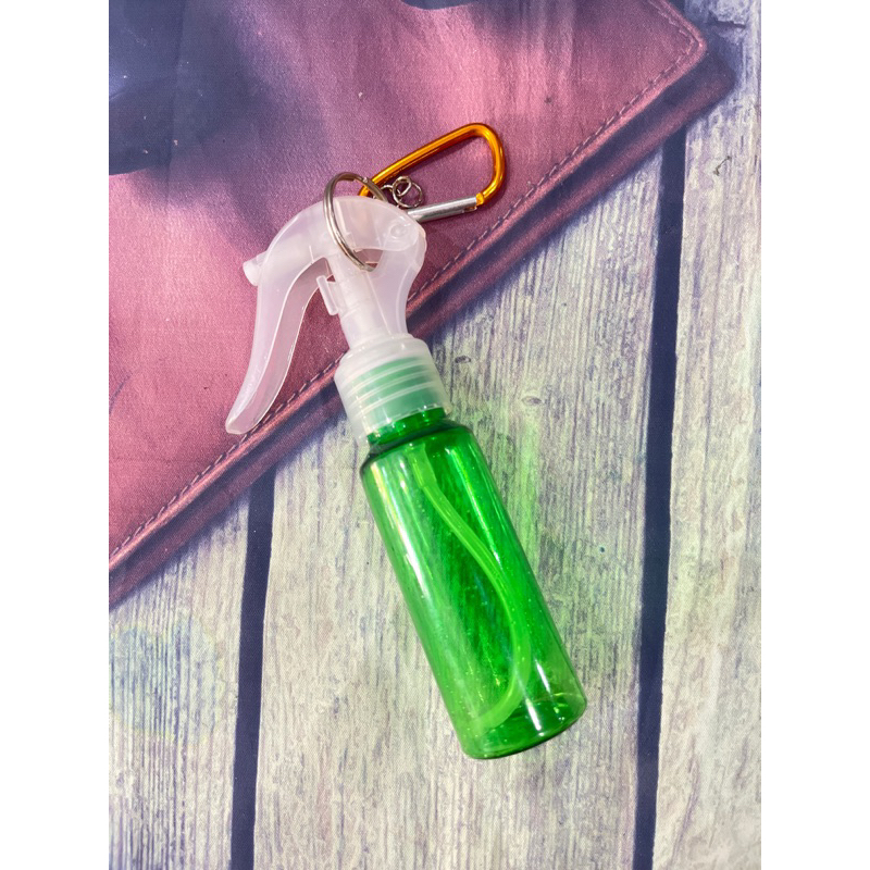 Chai xịt móc khóa 60ml bình chiết có móc gài carabiner.