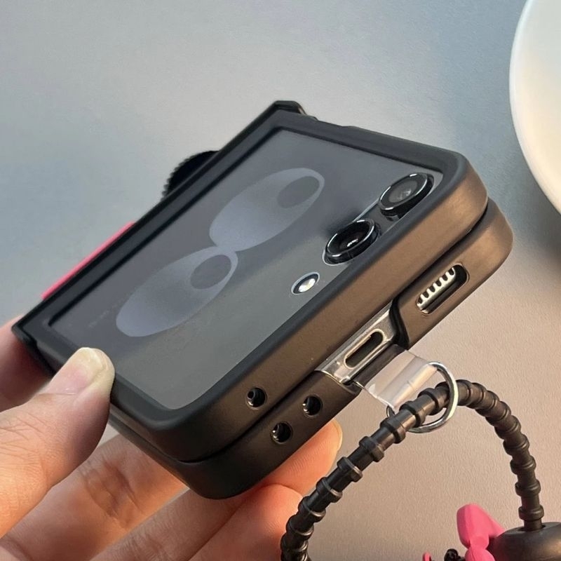 Ốp Z Flip5 - Z Flip4 - Z Flip3 - Flip5 5G đen matte charm bánh và dây pompom dễ thương kèm thanh bảo vệ bản lề