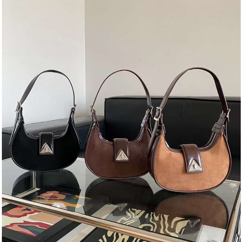 Túi xách đeo vai da lộn , The Peace