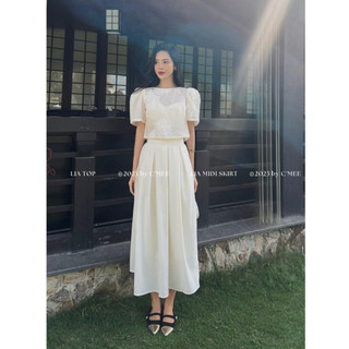   C'MEE  Set áo kiểu cột nơ Lia Top và chân váy xếp ly hộp dáng dài Lia Midi Skirt 