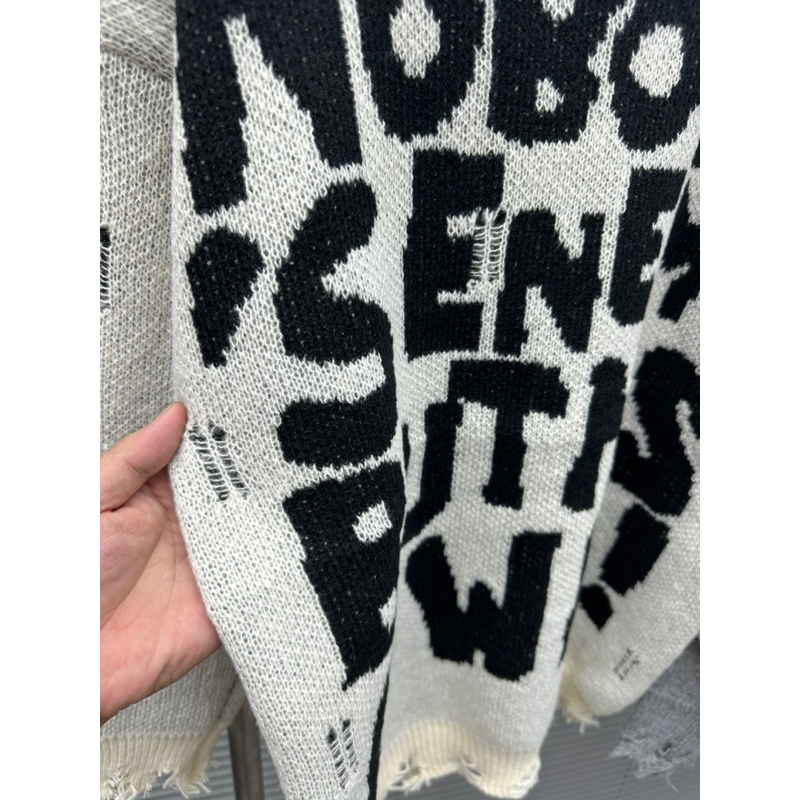 Áo khoac  len  nam  cổ ngắn boy phố rách  hàng  quảng  châu  bó thun in  chữ  hoa lá cành áo len nam 1 k