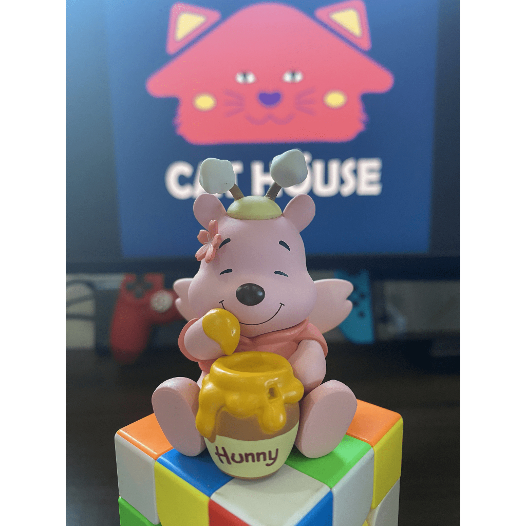 Đồ chơi mô hình Gấu Pooh nằm ngủ mô hình trang trí Gấu Pooh ăn mật ong mô hình quà tặng Gấu Pooh bông hoa