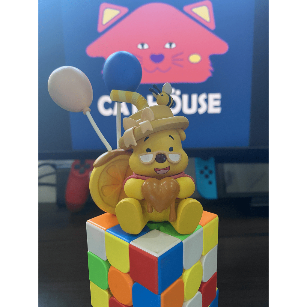 Đồ chơi mô hình Gấu Pooh nằm ngủ mô hình trang trí Gấu Pooh ăn mật ong mô hình quà tặng Gấu Pooh bông hoa