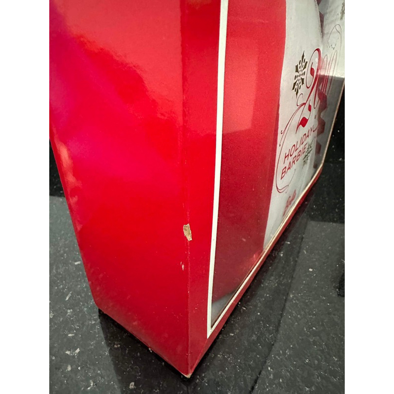 Búp bê Barbie Holiday 2010