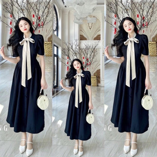 Đầm nơ nút bộc dáng dài