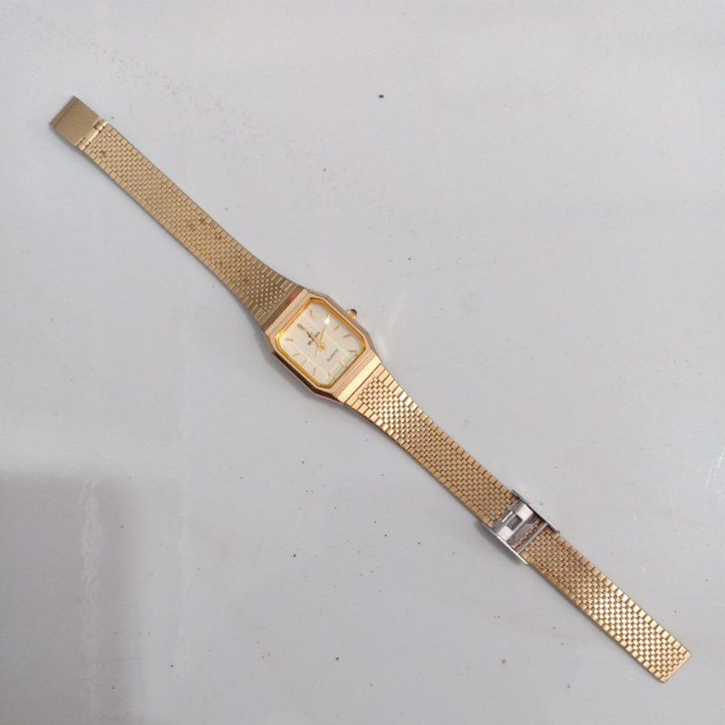 Đồng hồ si nữ mặt vuông tank hiệu BUREN dây thép lụa mạ vàng độ mới cao 91%