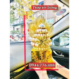 Tháp tỏi đặt ban thờ Thần Tài