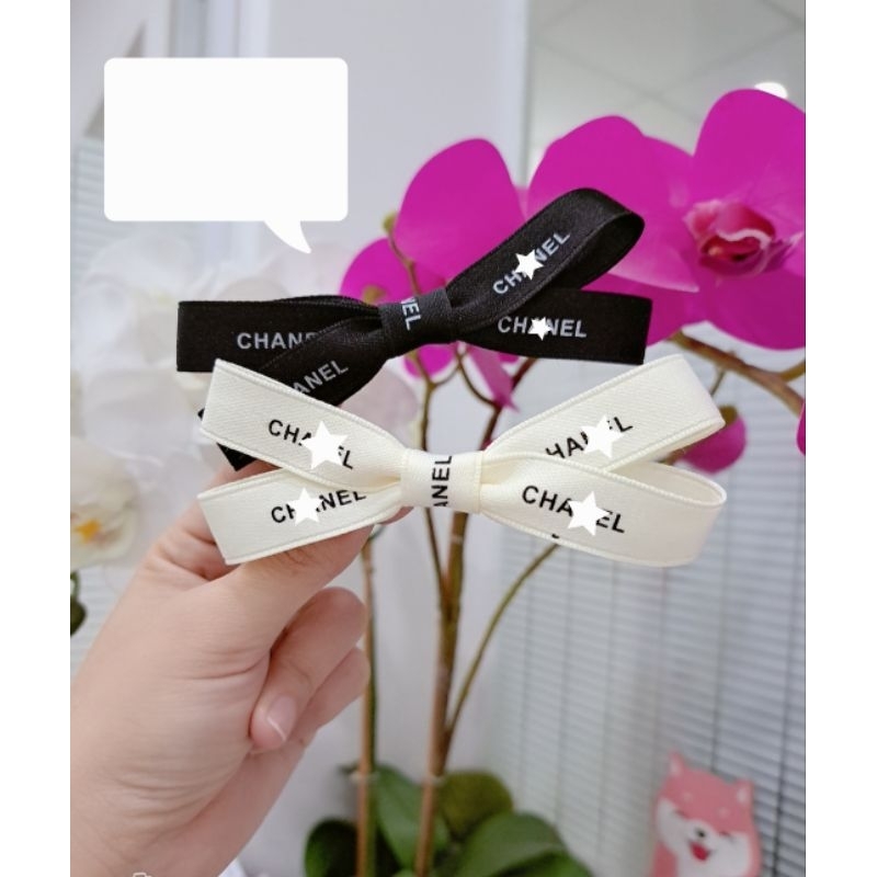 Kẹp tóc mái nơ chéo lụa mờ cao cấp
