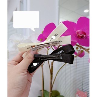Kẹp tóc mái nơ chéo lụa mờ cao cấp
