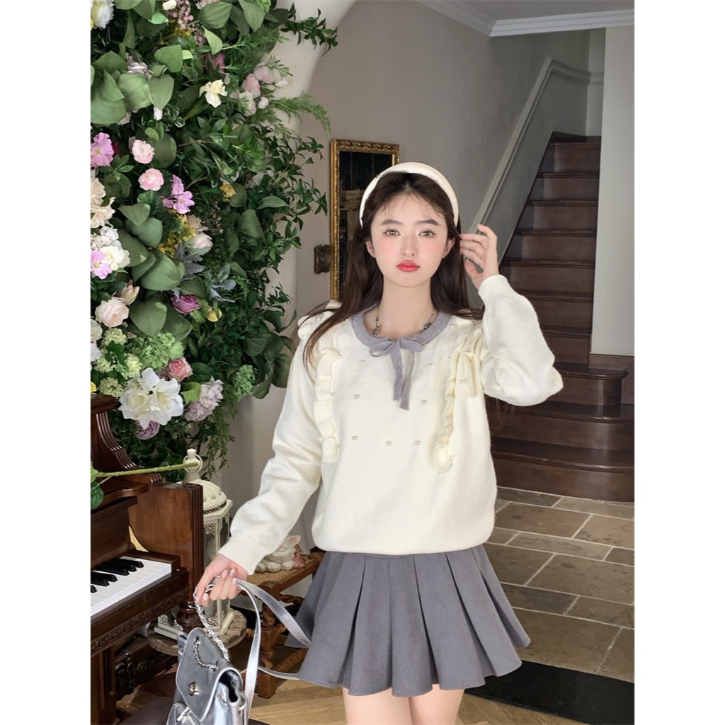 𝗺𝗶𝗲 𝘀𝘁𝘂𝗱𝗶𝗼 - HÀNG CÓ SẴN Áo len trắng cổ tròn dây xám đính hạt ngọc dễ thương