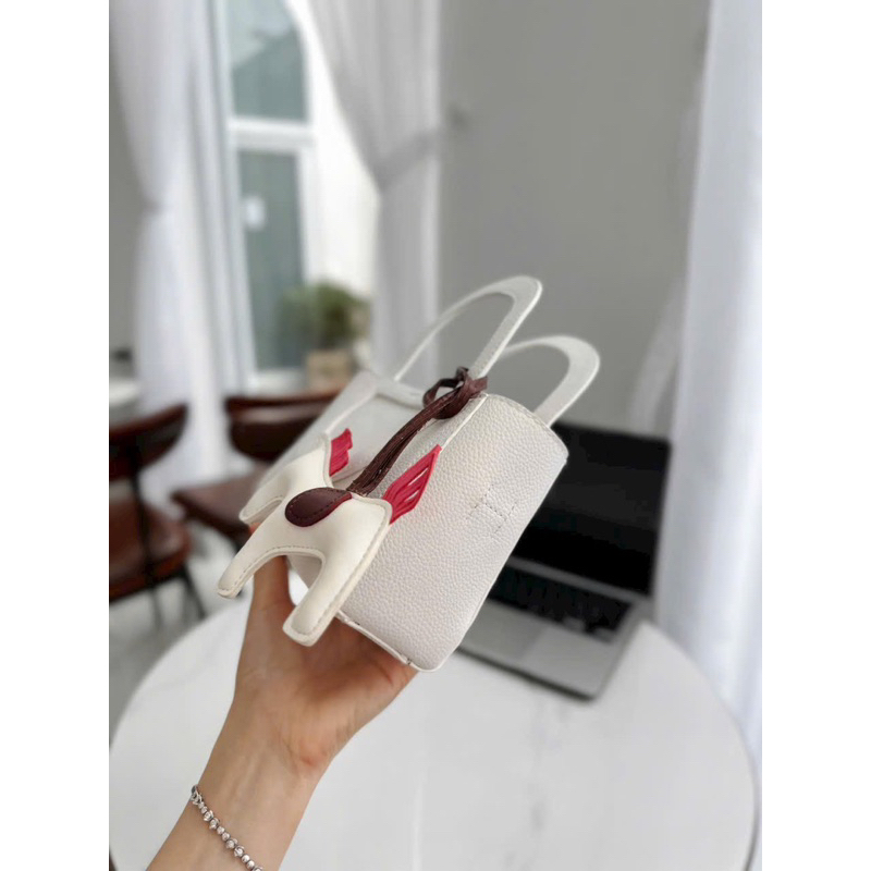 Túi đeo chéo kèm phụ kiện