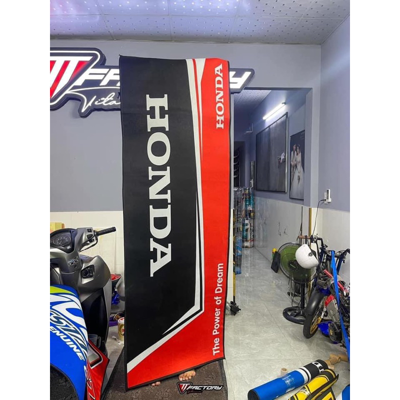 Thảm lót trưng bày xe máy