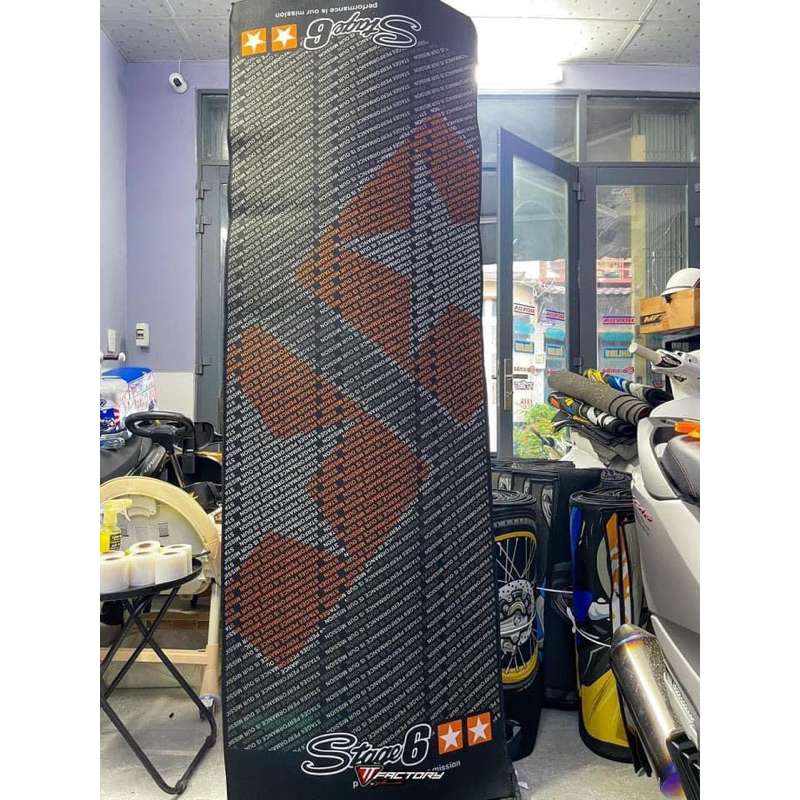 Thảm lót trưng bày xe máy