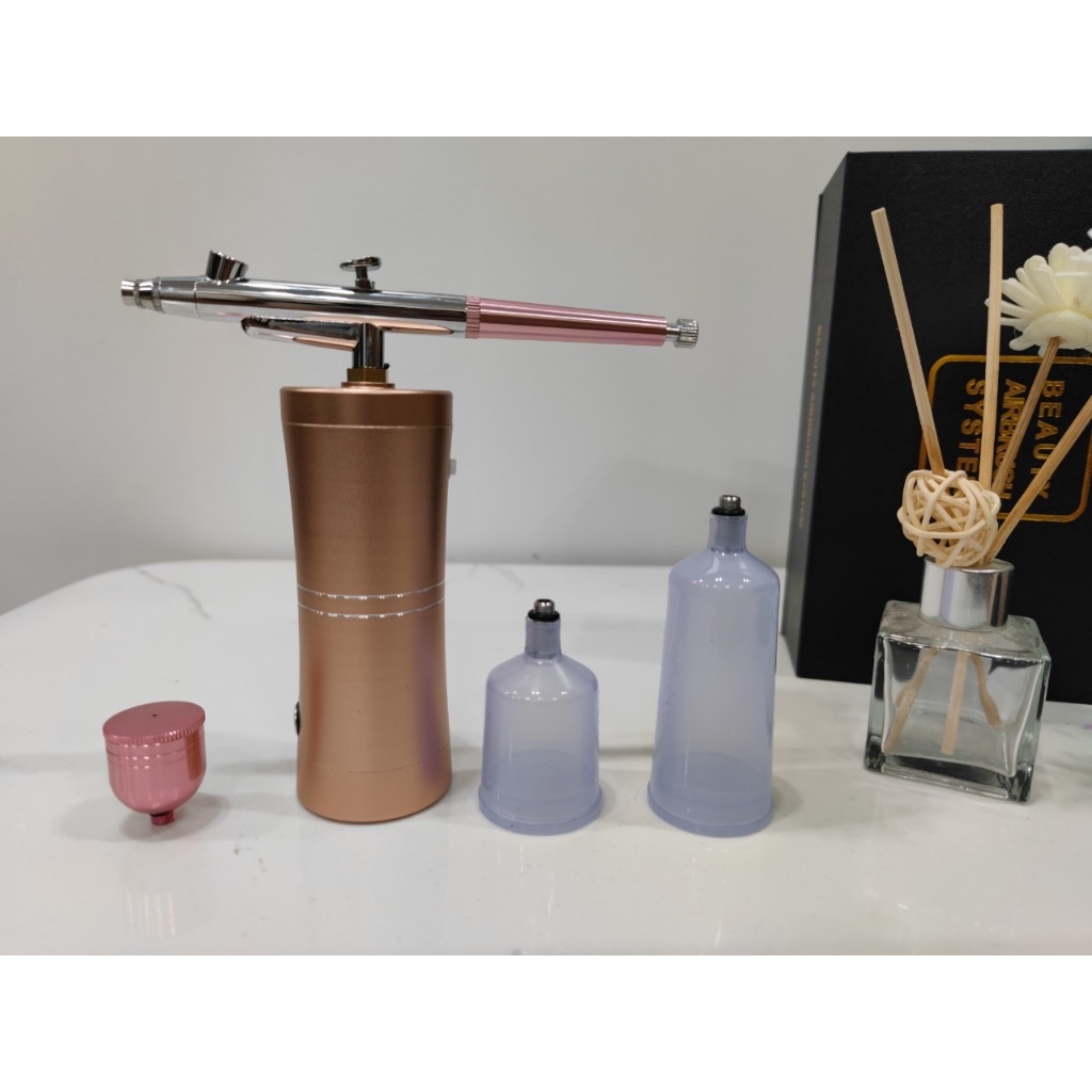 Máy Phun Oxy . Máy Phun Tinh Chất Cầm Tay