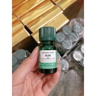 Tinh dầu trà dành cho da mụn tea tree oil The Body Shop