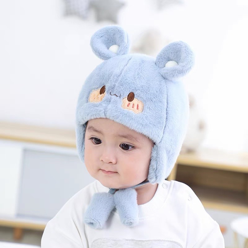 Mũ đội chùm tai giữ ấm cho bé xinh xắn